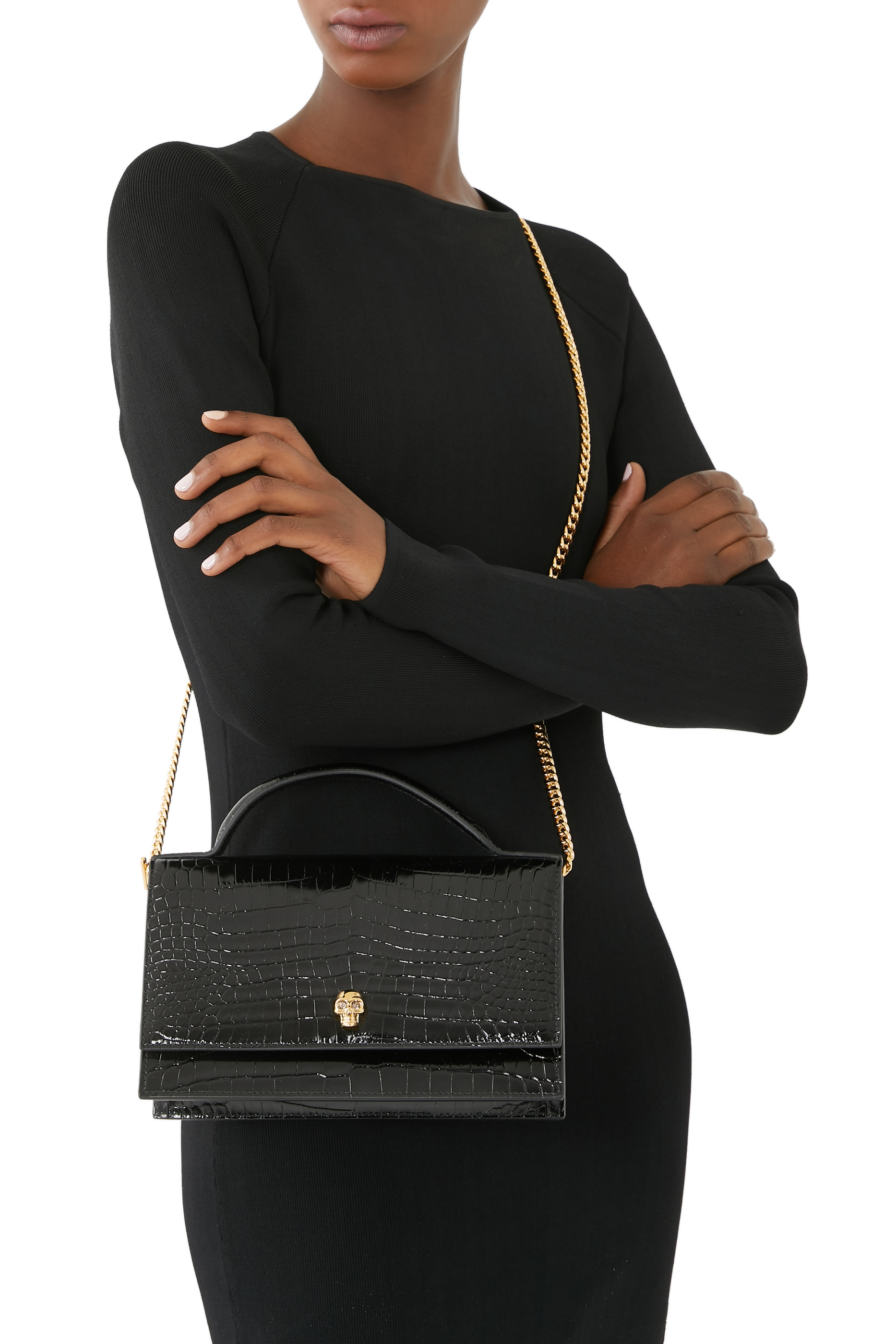 حقيبة بحلية جمجمة ونقشة جلد التمساح