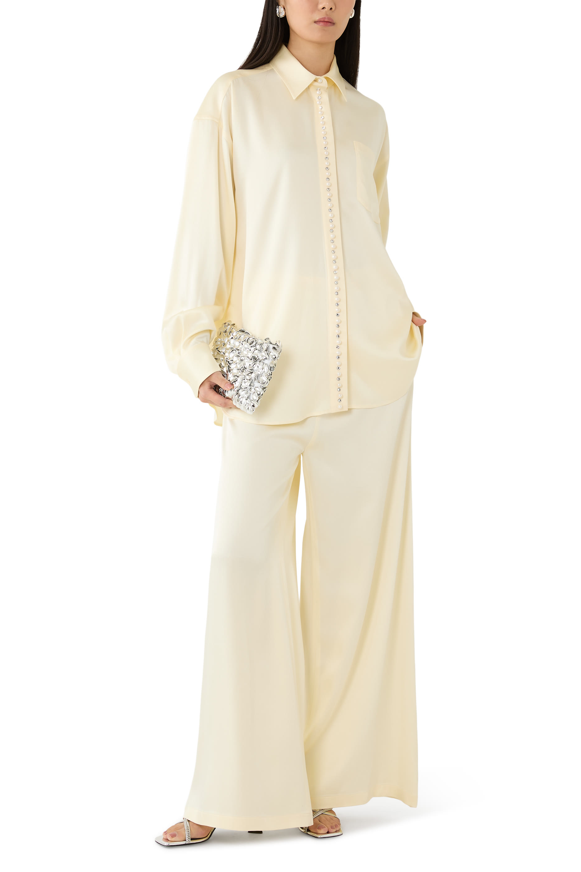 قميص مزين بلؤلؤ