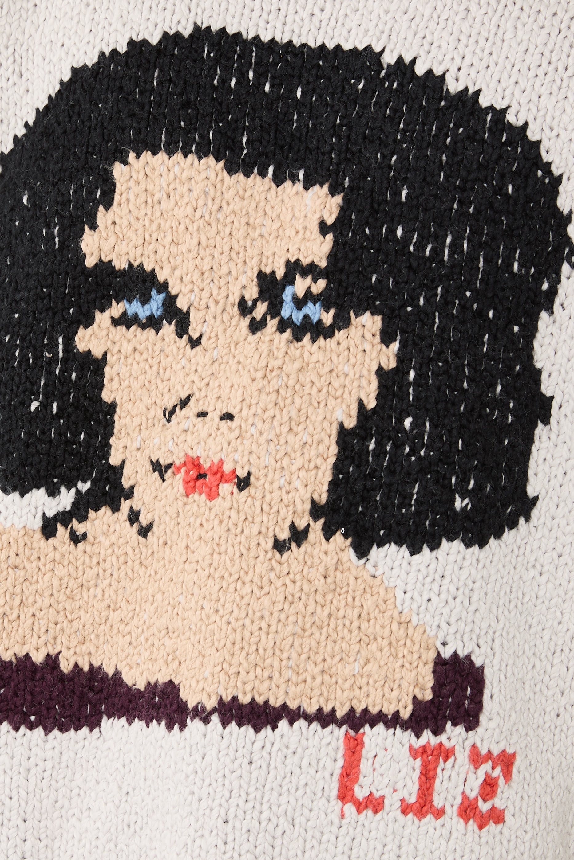 كنزة منسوجة يدويا بنقشة ليز