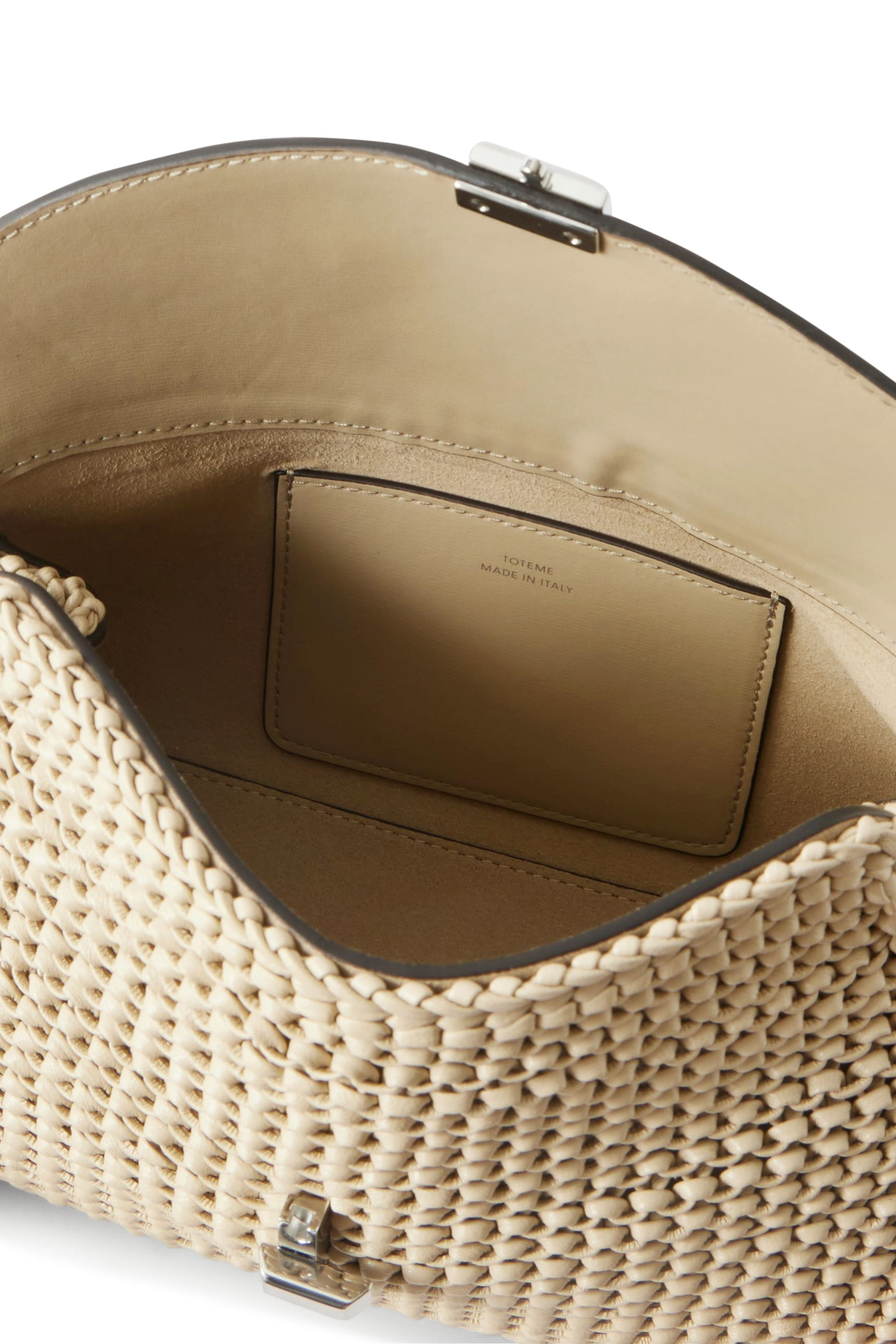 حقيبة بيد علوية وقفل T جلد منسوج