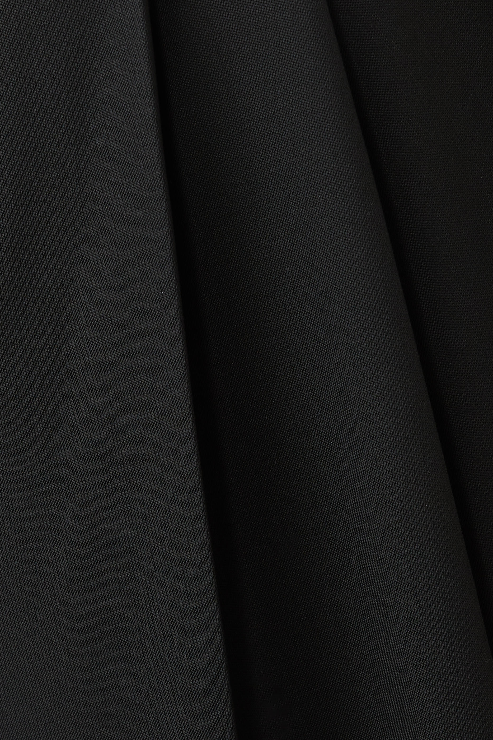 بنطال بقصة ساق واسعة وطيات