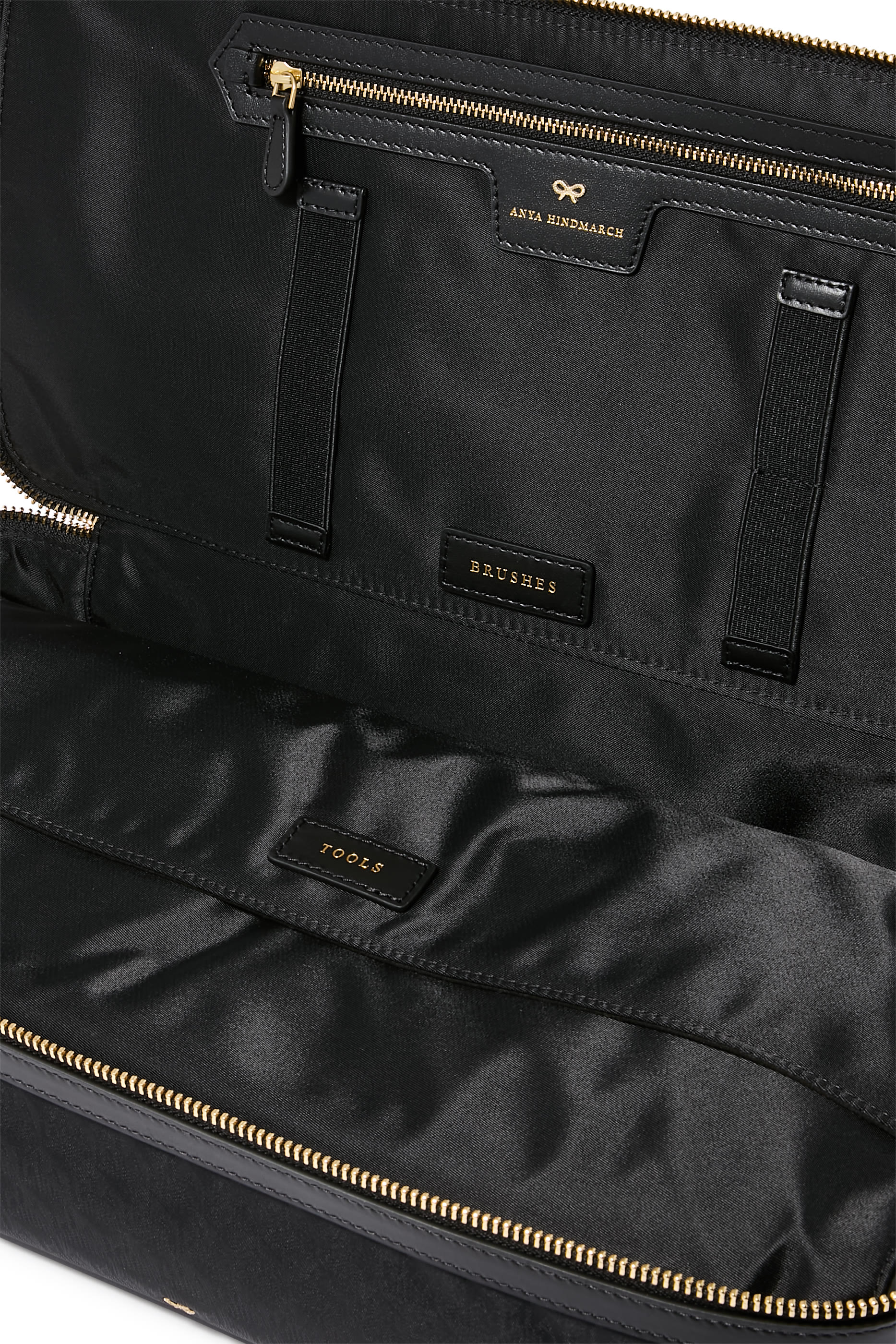 حقيبة مستلزمات شعر صغيرة للسفر بشعار الماركة