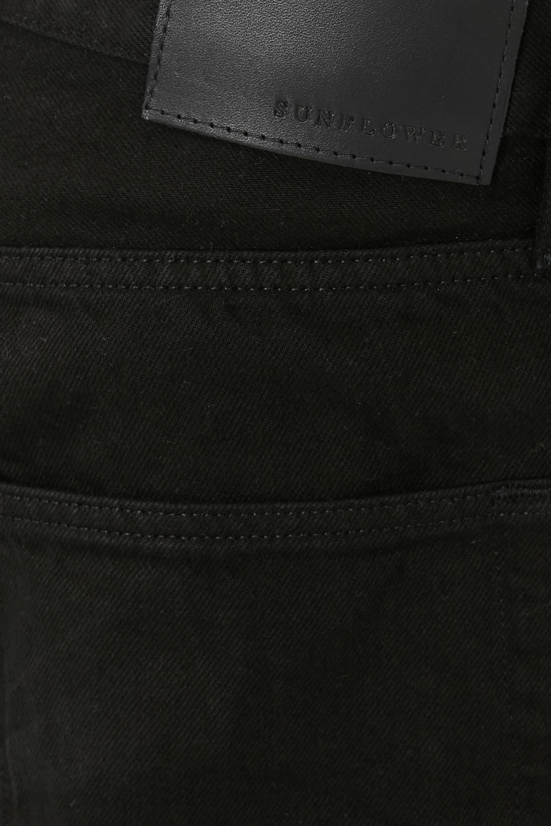 بنطال دنيم مصبوغ بقصة واسعة