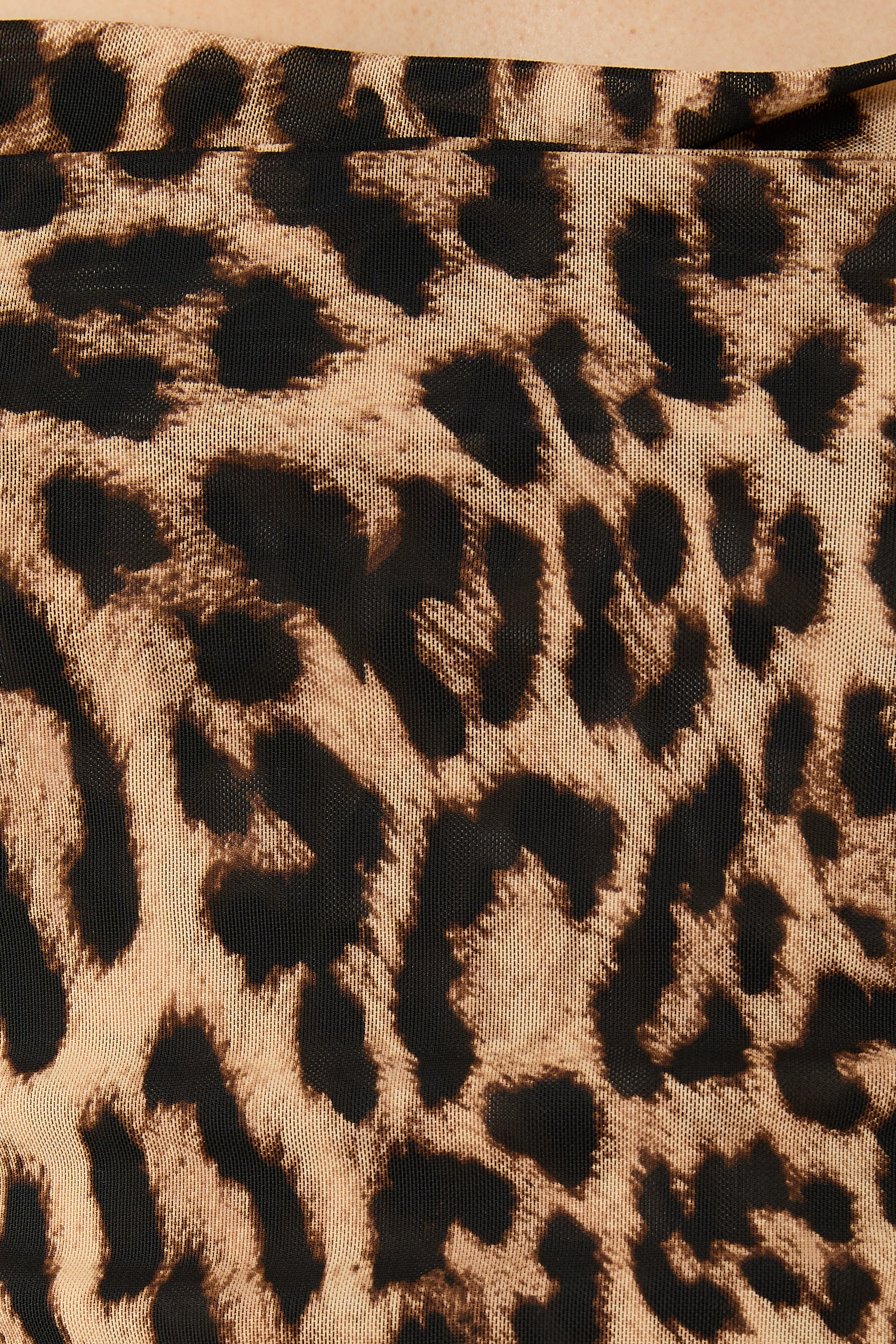 بلوزة بطبعة جلد نمر