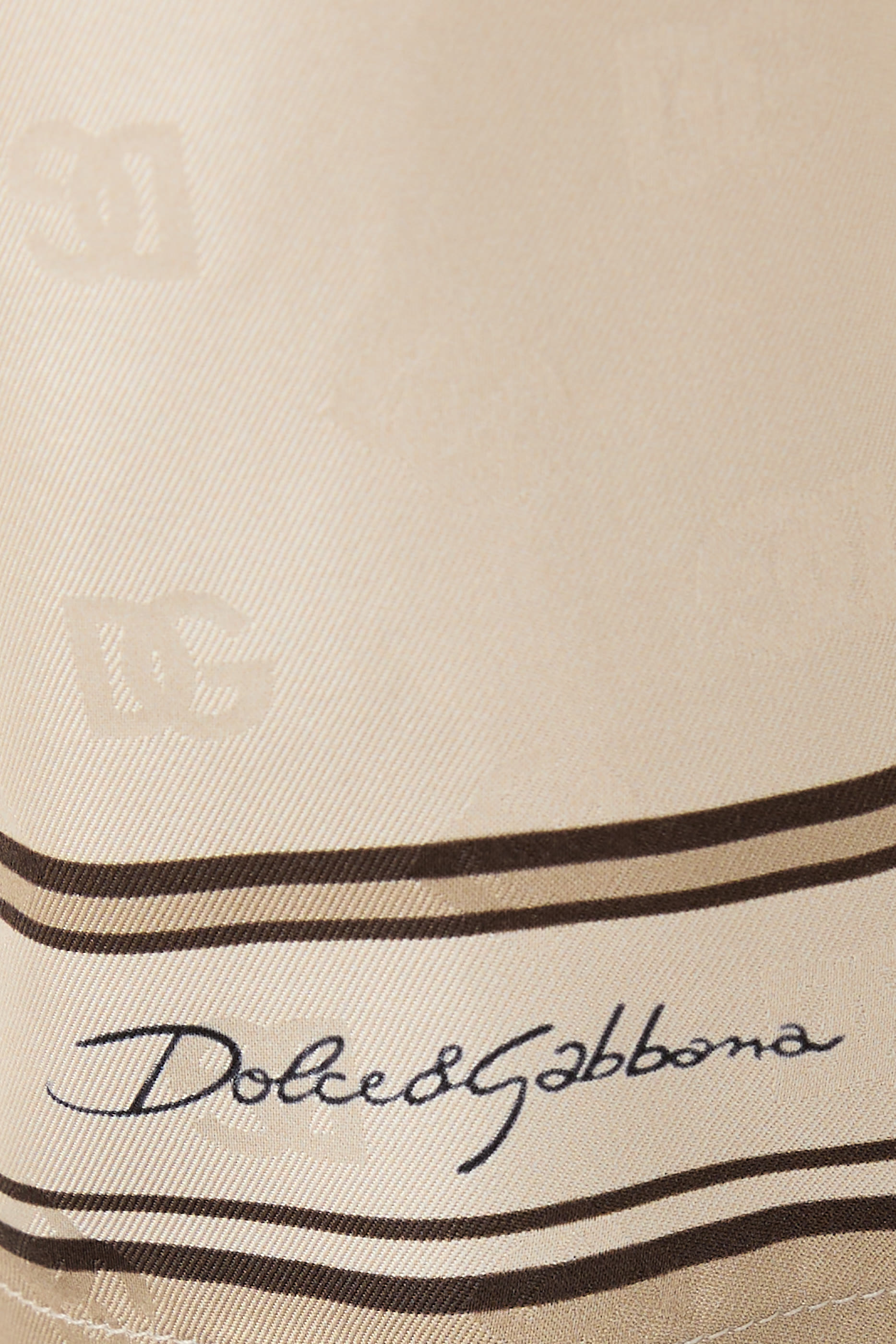 بنطال بطبعة شعار الماركة تويل