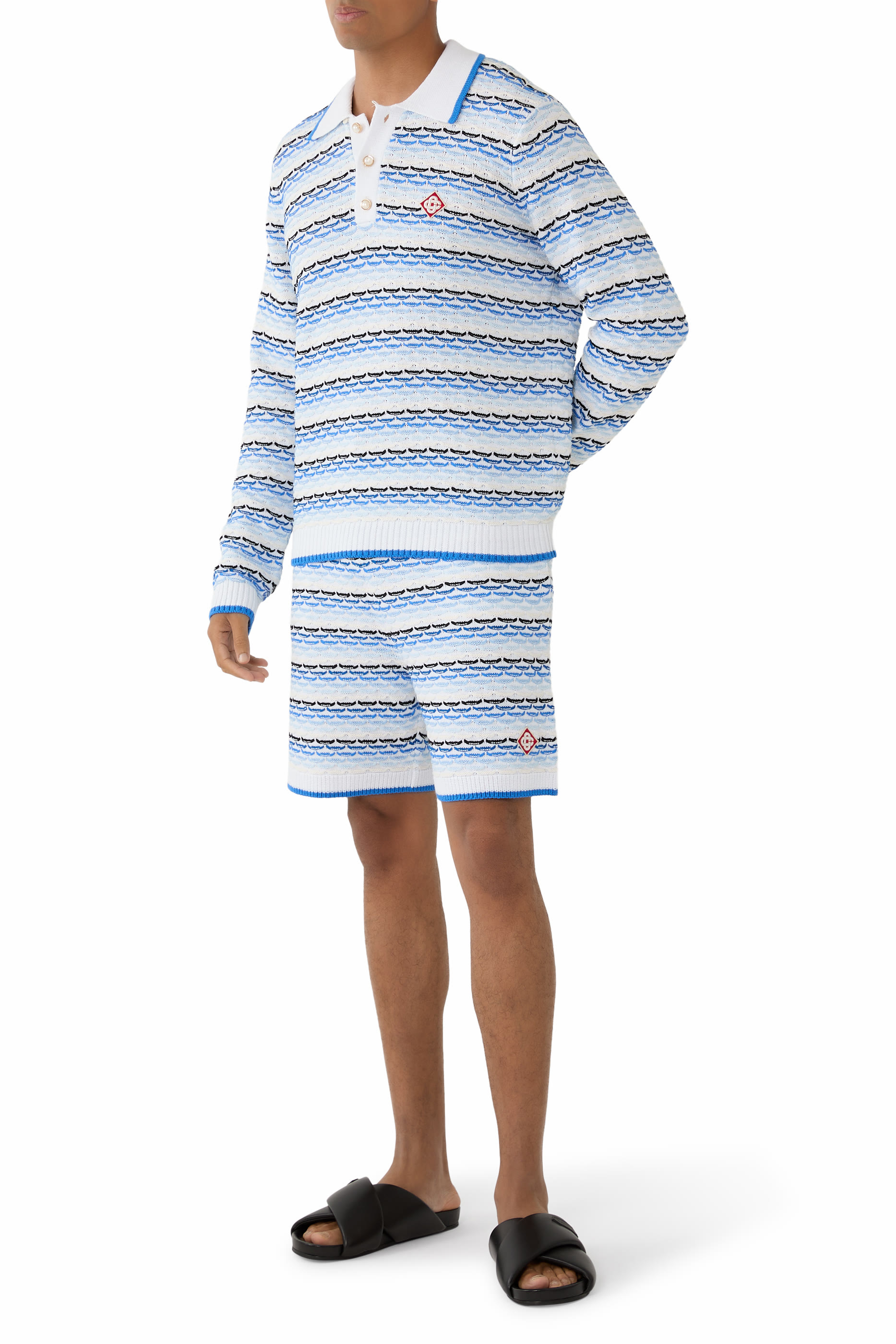 قميص بولو بأكمام طويلة بغرزة مطوية