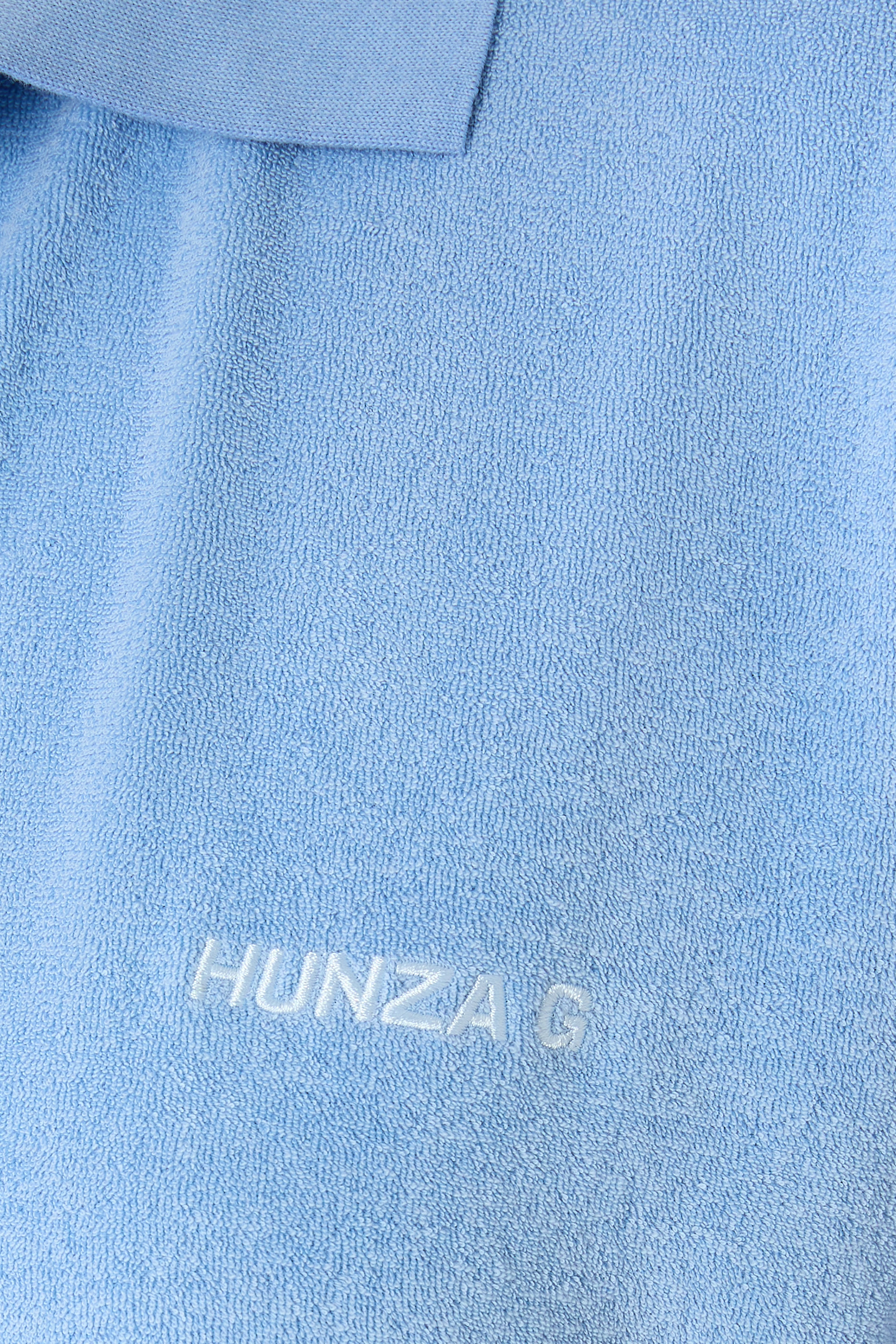 قميص بولو قماش مناشف تيري