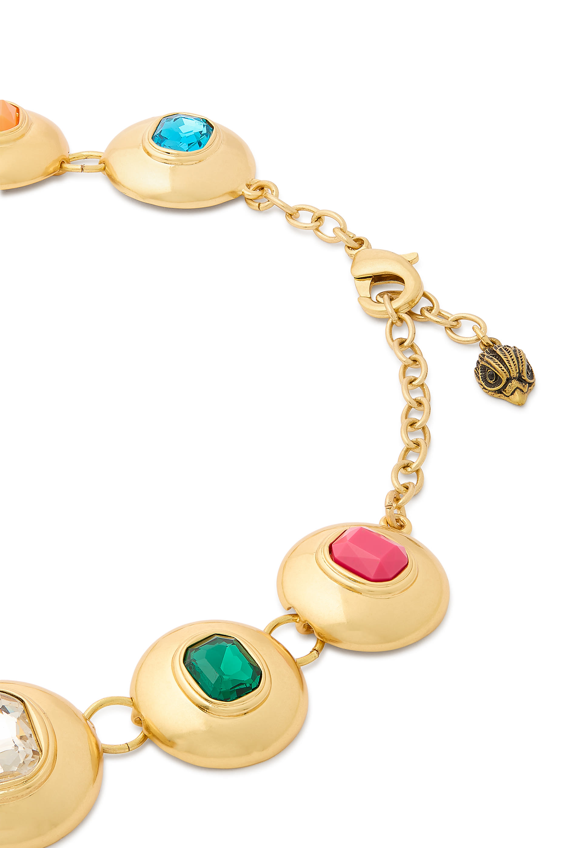 قلادة بحلي بتصميم مقبب مرصعة بأحجار على شكل زمردي