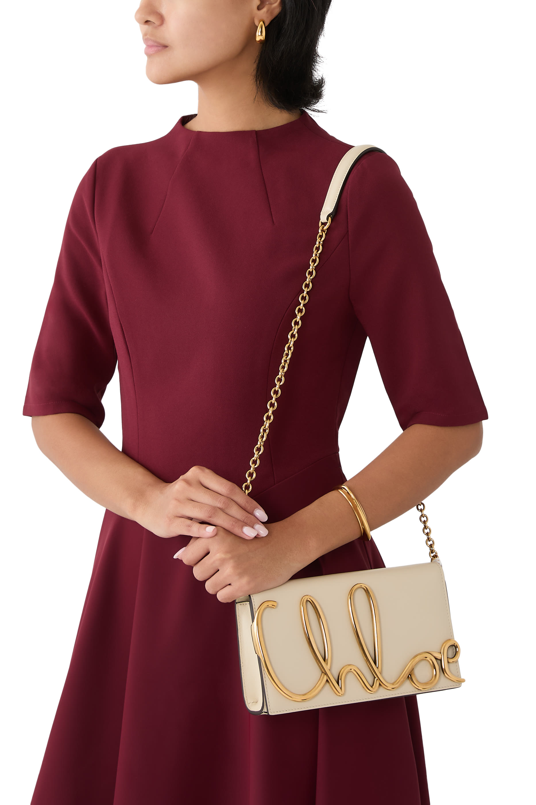 حقيبة كروس بشعار الماركة جلد ناعم