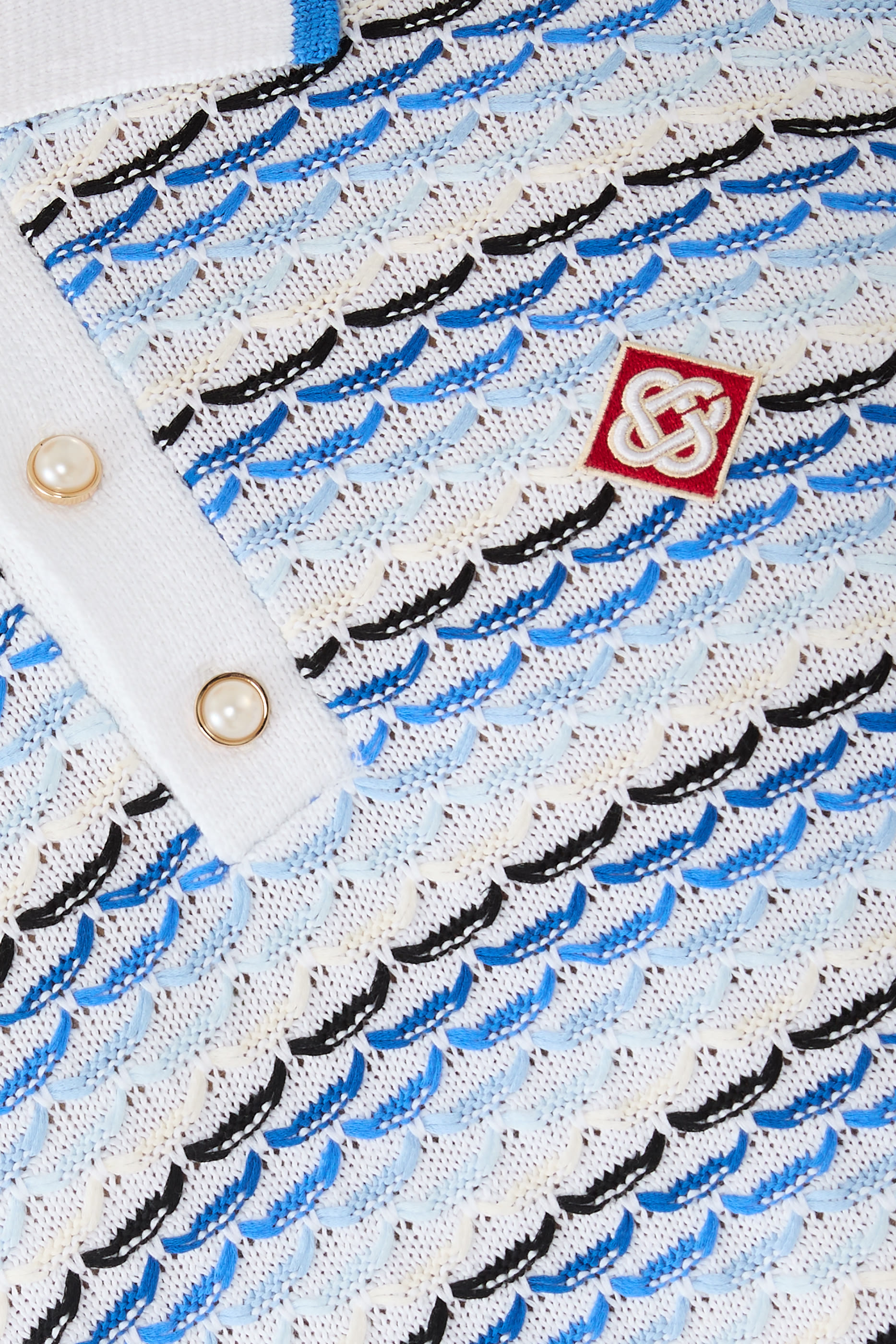 قميص بولو بأكمام طويلة بغرزة مطوية