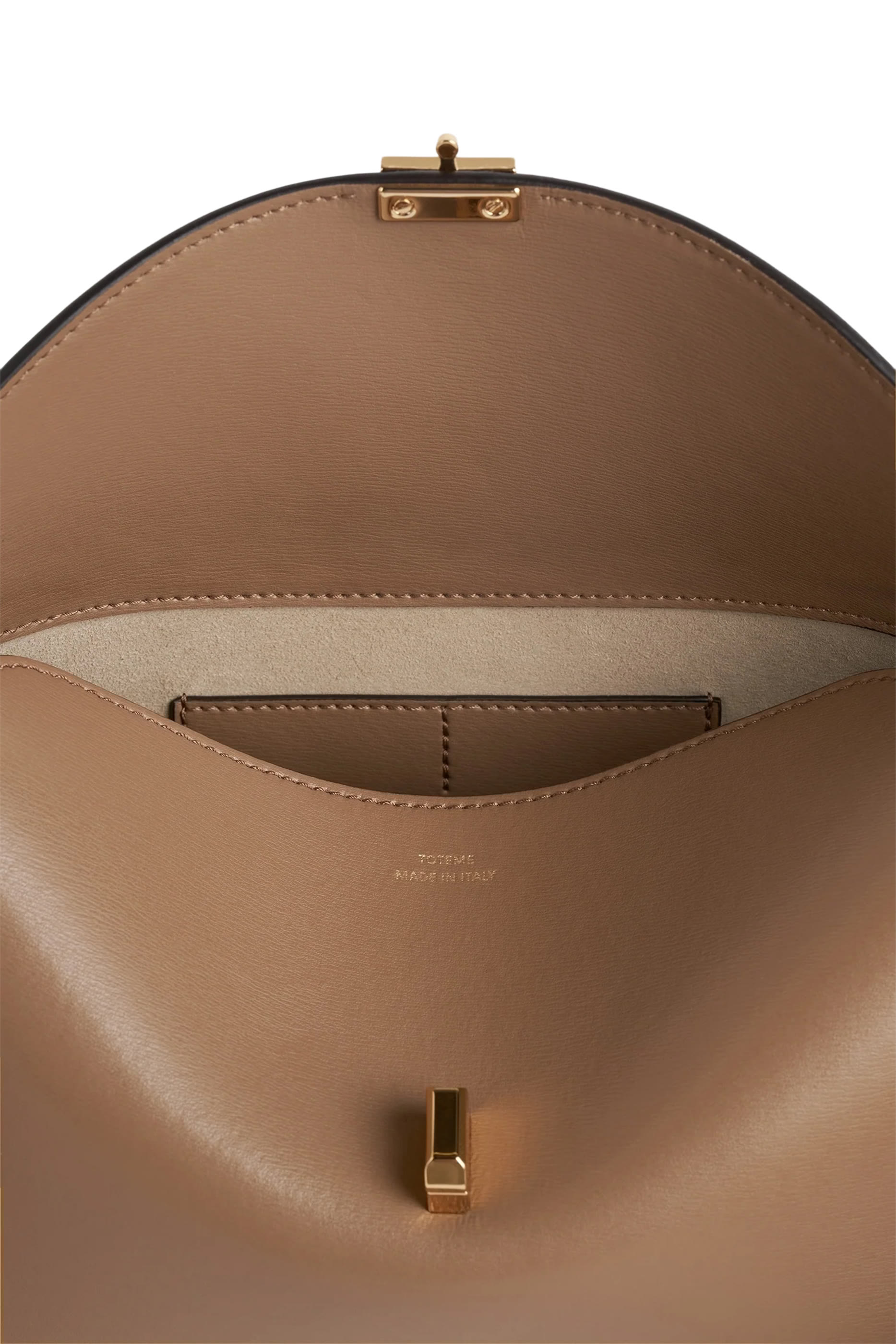 حقيبة كلاتش بقفل على شكل حرف T