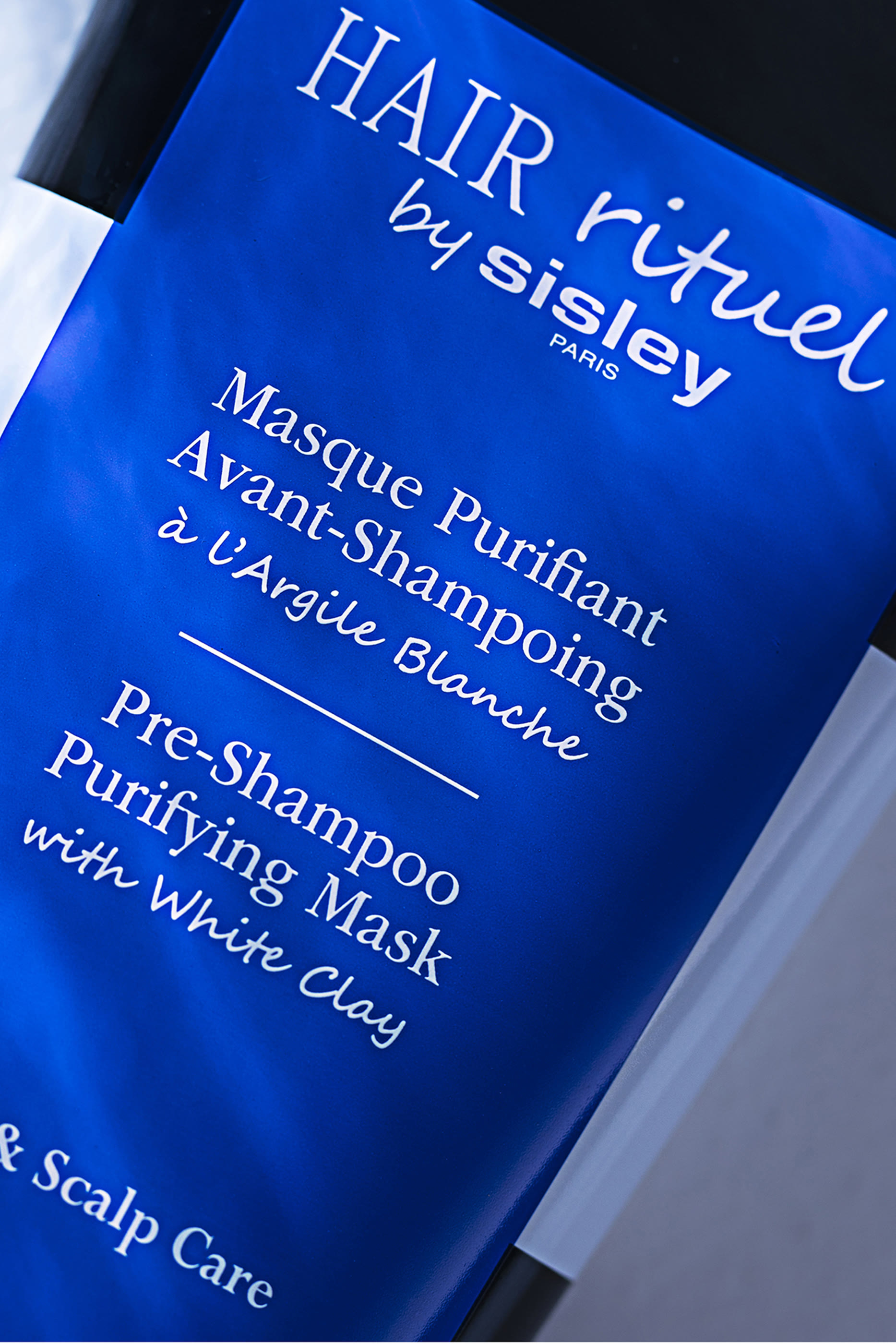 قناع قبل الشامبو للتنقية من السموم بالطمي الأبيض