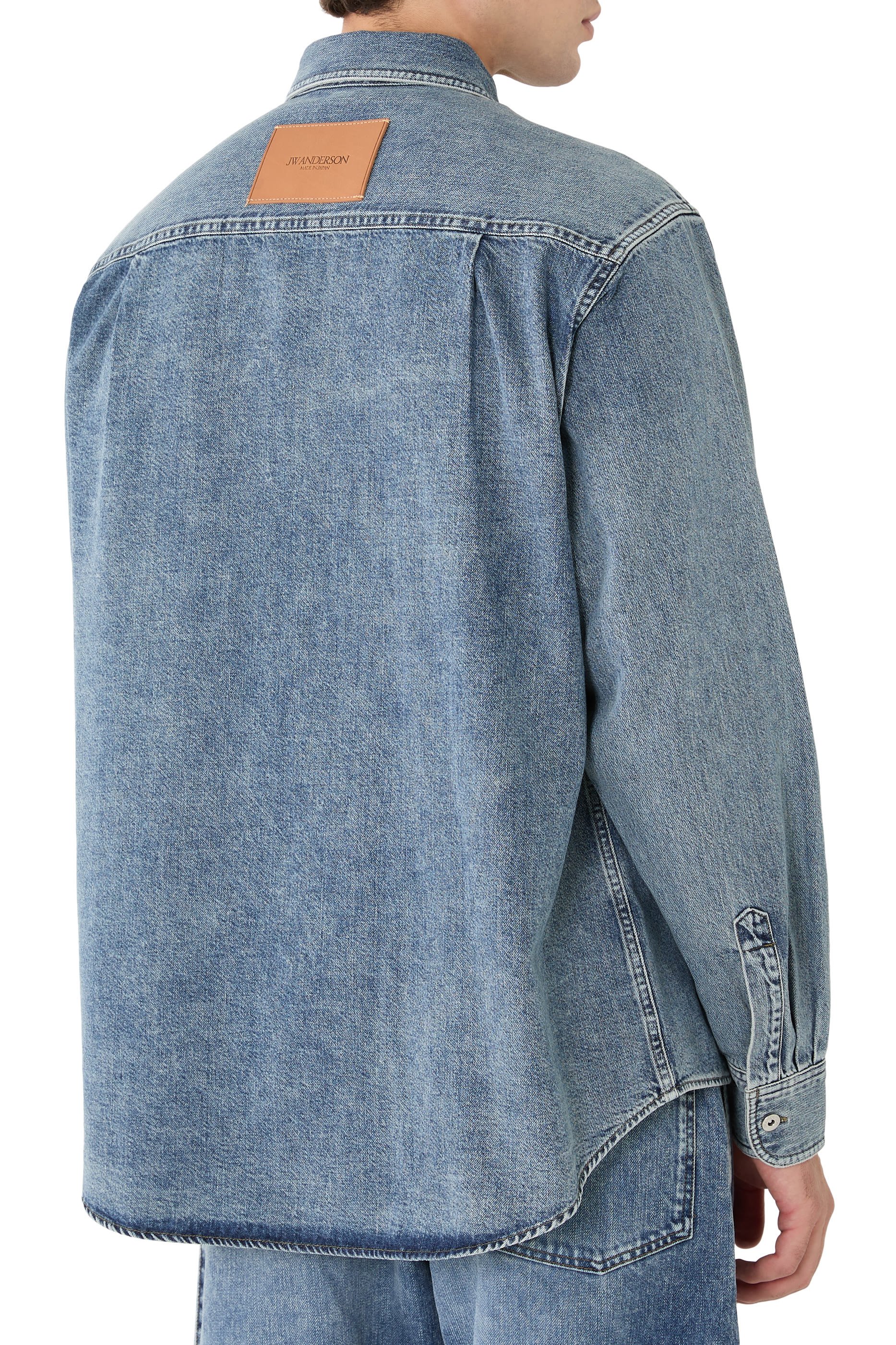 قميص بقصة فضفاضة دنيم