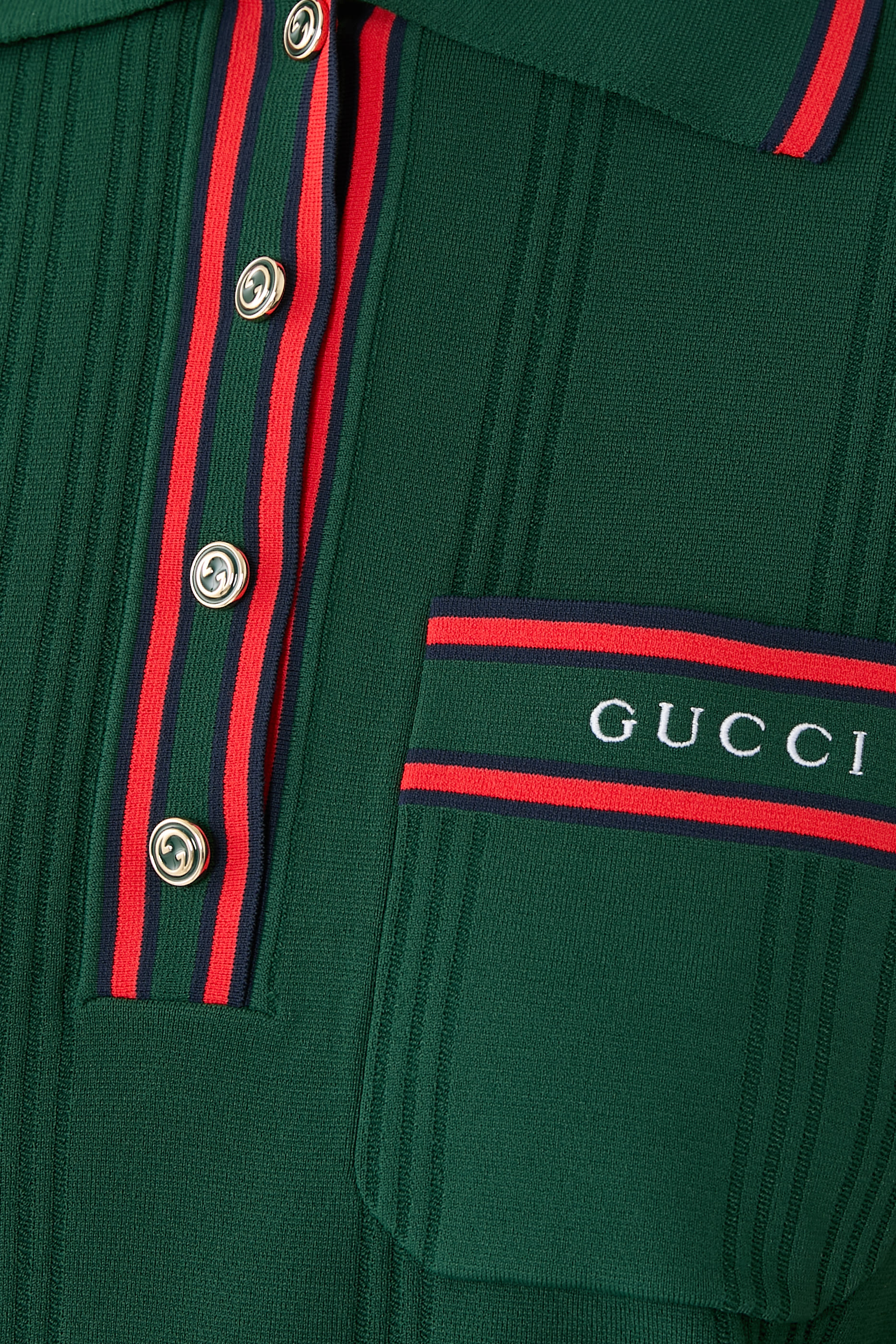 قميص بولو بحواف مخططة